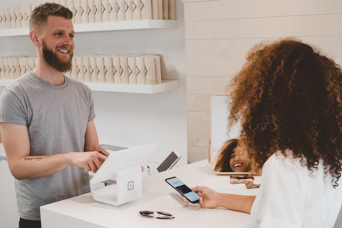 Customer using mobile banking on a smartphone to manage accounts securely from anywhere